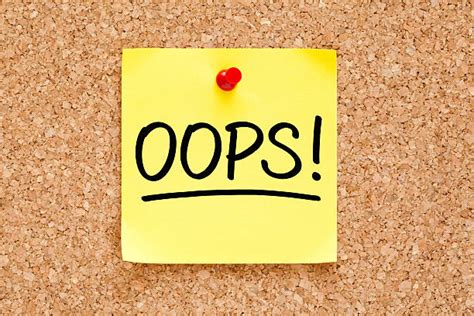 Corkboard with a pinned yellow note; it reads 'Ooops!'